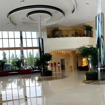 Hotel Ramada Plaza By Wyndham Hangzhou Riverside Exterior foto